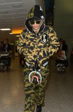 RITA ORA at Heathrow Airport in London 12/24/2015