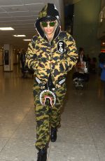 RITA ORA at Heathrow Airport in London 12/24/2015