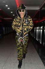 RITA ORA at Heathrow Airport in London 12/24/2015