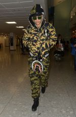 RITA ORA at Heathrow Airport in London 12/24/2015
