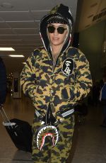 RITA ORA at Heathrow Airport in London 12/24/2015