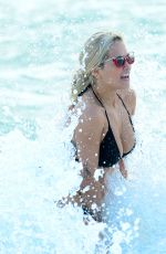 RITA ORA in Black Bikini at a Beach in Miami 12/28/2015