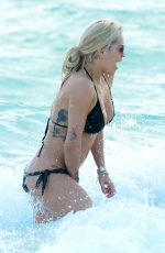 RITA ORA in Black Bikini at a Beach in Miami 12/28/2015