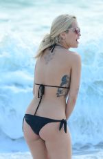 RITA ORA in Black Bikini at a Beach in Miami 12/28/2015