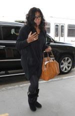 SERENA WILLIAMS Arrives at LAX Airport in Los Angeles 12/10/2015