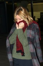 SIENNA MILLER at Heathrow Airport in London 12/14/2015