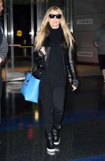 STACY FERGIE FERGUSON at JFK Airport in New York 12/04/2015