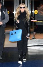 STACY FERGIE FERGUSON at JFK Airport in New York 12/04/2015