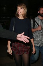 TAYLOR SWIFT Arrives at LAX Airport in Los Angeles 12/13/2015