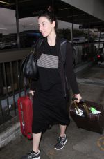 WHITNEY CUMMINGS Make-up Free at LAX Airport in Los Angeles 12/22/2015