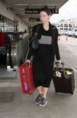 WHITNEY CUMMINGS Make-up Free at LAX Airport in Los Angeles 12/22/2015