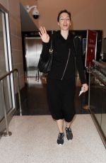 WHITNEY CUMMINGS Make-up Free at LAX Airport in Los Angeles 12/22/2015