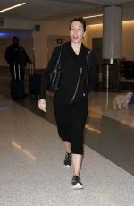 WHITNEY CUMMINGS Make-up Free at LAX Airport in Los Angeles 12/22/2015