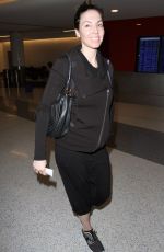 WHITNEY CUMMINGS Make-up Free at LAX Airport in Los Angeles 12/22/2015