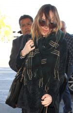 /DAKOTA JOHNSON Arrives at LAX Airport in Los Angeles 01/07/2016