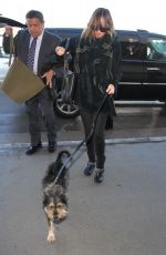 /DAKOTA JOHNSON Arrives at LAX Airport in Los Angeles 01/07/2016