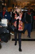 ANNABELLE WALLIS is at LAX Airport in Los Angeles 12/28/2015