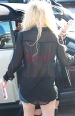 AVRIL LAVIGNE in Ripped Denim Shorts Out in Loa Angeles 01/26/2016