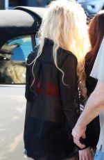 AVRIL LAVIGNE in Ripped Denim Shorts Out in Loa Angeles 01/26/2016