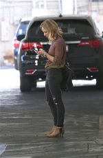 BRITTANY SNOW Waits for Her Car in Beverly Hills 01/28/2016