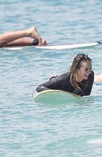 CARA DELEVINGNE and ANNIE CLARK Paddleboarding in Barbados 01/03/2016