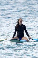 CARA DELEVINGNE and ANNIE CLARK Paddleboarding in Barbados 01/03/2016