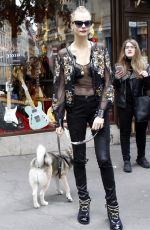 CARA DELEVINGNE at The Guitar Legend Store in Paris 01/26/2016