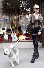 CARA DELEVINGNE at The Guitar Legend Store in Paris 01/26/2016