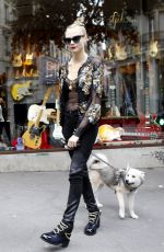 CARA DELEVINGNE at The Guitar Legend Store in Paris 01/26/2016