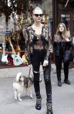 CARA DELEVINGNE at The Guitar Legend Store in Paris 01/26/2016