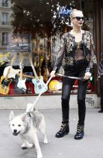 CARA DELEVINGNE at The Guitar Legend Store in Paris 01/26/2016