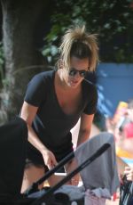 CAROLINE FLACK Relaxing at a Pool in Miami 01/04/2016