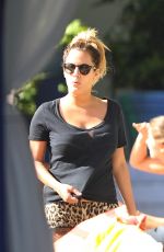 CAROLINE FLACK Relaxing at a Pool in Miami 01/04/2016