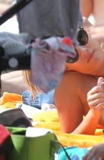 CAROLINE FLACK Relaxing at a Pool in Miami 01/04/2016