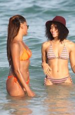 CLAUDIA JORDAN and ANNIE ILONZEH in Bikinis at a Beach in Miami 01/01/2016