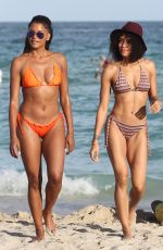 CLAUDIA JORDAN and ANNIE ILONZEH in Bikinis at a Beach in Miami 01/01/2016