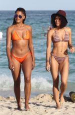 CLAUDIA JORDAN and ANNIE ILONZEH in Bikinis at a Beach in Miami 01/01/2016