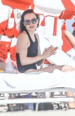 DAISY RIDLEY in Swimsuit at a Beach in Miami 01/04/2016