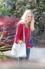 DAKOTA FANNING on the Set od Please Stand By in Los Angeles 01/13/2016