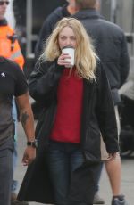 DAKOTA FANNING on the Set od Please Stand By in Los Angeles 01/13/2016