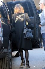 DAKOTA JOHNSON Arrives at Chateau Marmont in Los Angeles 01/26/2016