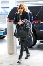 DAKOTA JOHNSON at JFK Airport in New York 01/16/2016