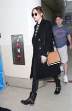 DAKOTA JOHNSON at Los Angeles International Airport 01/16/2016