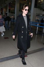 DAKOTA JOHNSON at Los Angeles International Airport 01/16/2016