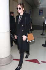 DAKOTA JOHNSON at Los Angeles International Airport 01/16/2016