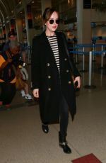 DAKOTA JOHNSON at Los Angeles International Airport 01/16/2016