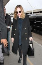 DAKOTA JOHNSON at Los Angeles International Airport 01/18/2016