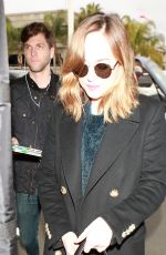 DAKOTA JOHNSON at Los Angeles International Airport 01/18/2016
