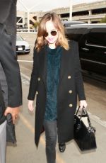 DAKOTA JOHNSON at Los Angeles International Airport 01/18/2016