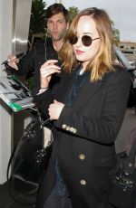 DAKOTA JOHNSON at Los Angeles International Airport 01/18/2016
